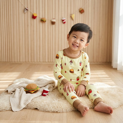 kids long sleeve bamboo sleepwear 2 piece set slim fit in yellow snackie design consist of ice cream sundae, fizzy drinks, burgers and fries.