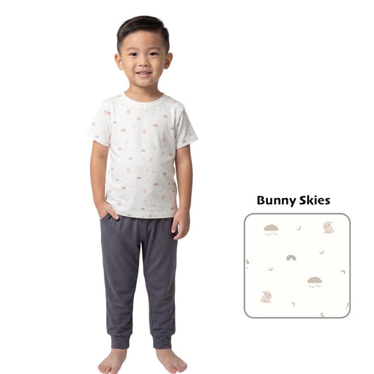 kids wearing bamboo t shirt with cream base. The prints on it will be cloud, rabbit, shooting stars and rainbow