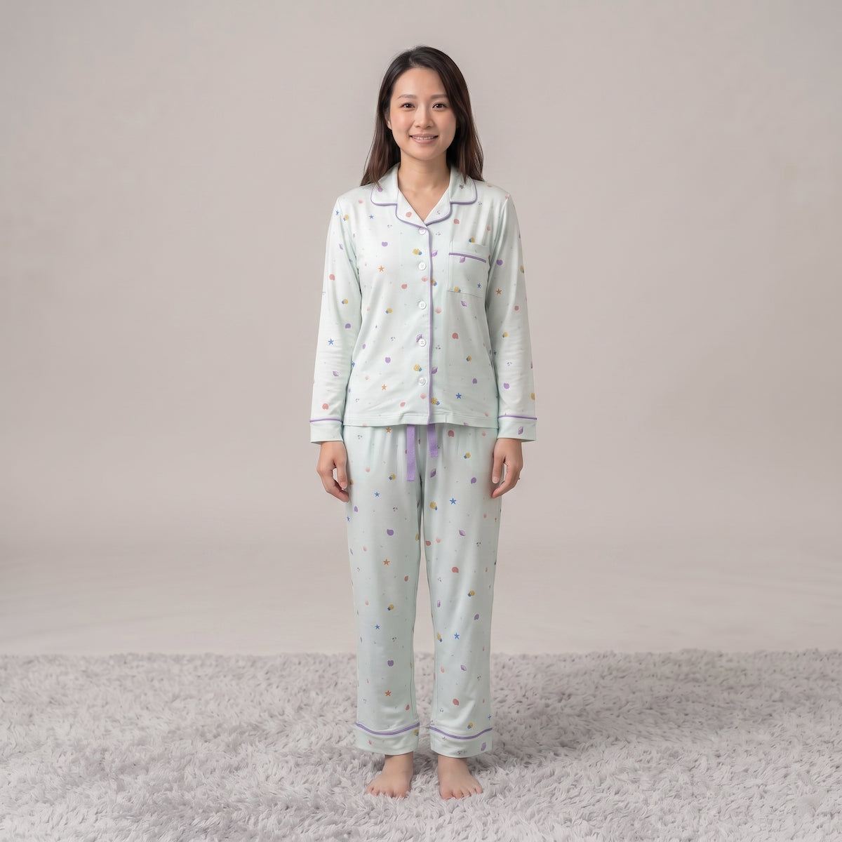 women wearing Cuteboid bamboo cooling pyjamas in Little Lagoon design. Comes in long sleeve tops and long pants set