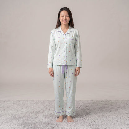 women wearing Cuteboid bamboo cooling pyjamas in Little Lagoon design. Comes in long sleeve tops and long pants set