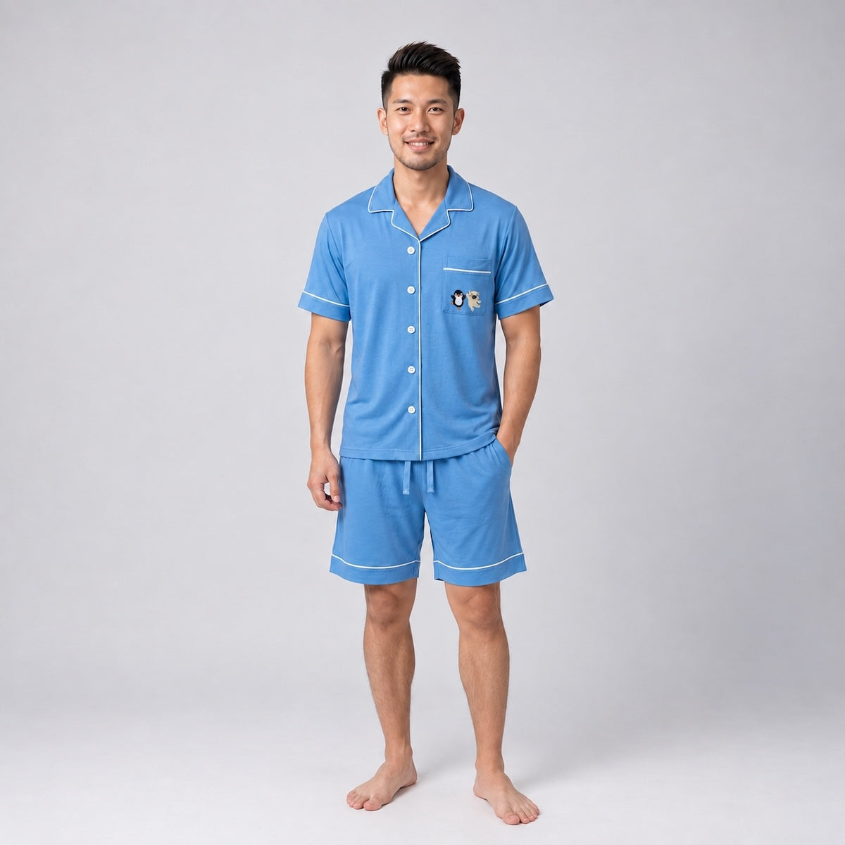 men wearing blue colour bamboo short sleeve pyjamas set. Comes with collar and buttons on the tops. Comfortable and cooling bamboo materials for Singapore hot and humid weather